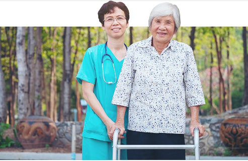 Elderly woman with hospice nurse
